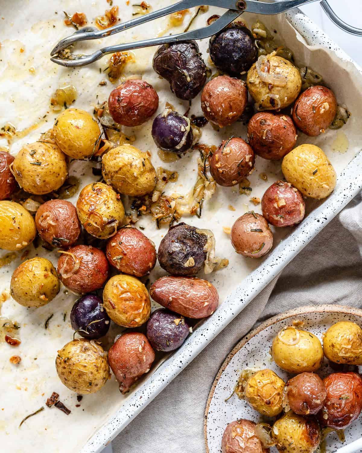 completed Roasted Rosemary Potatoes in a white tray