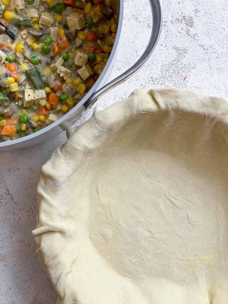 pie crust alongside filling mixture