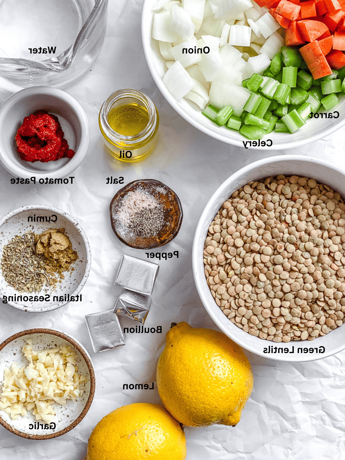 ingredients for Lemon Lentil Soup measured out on a white surface