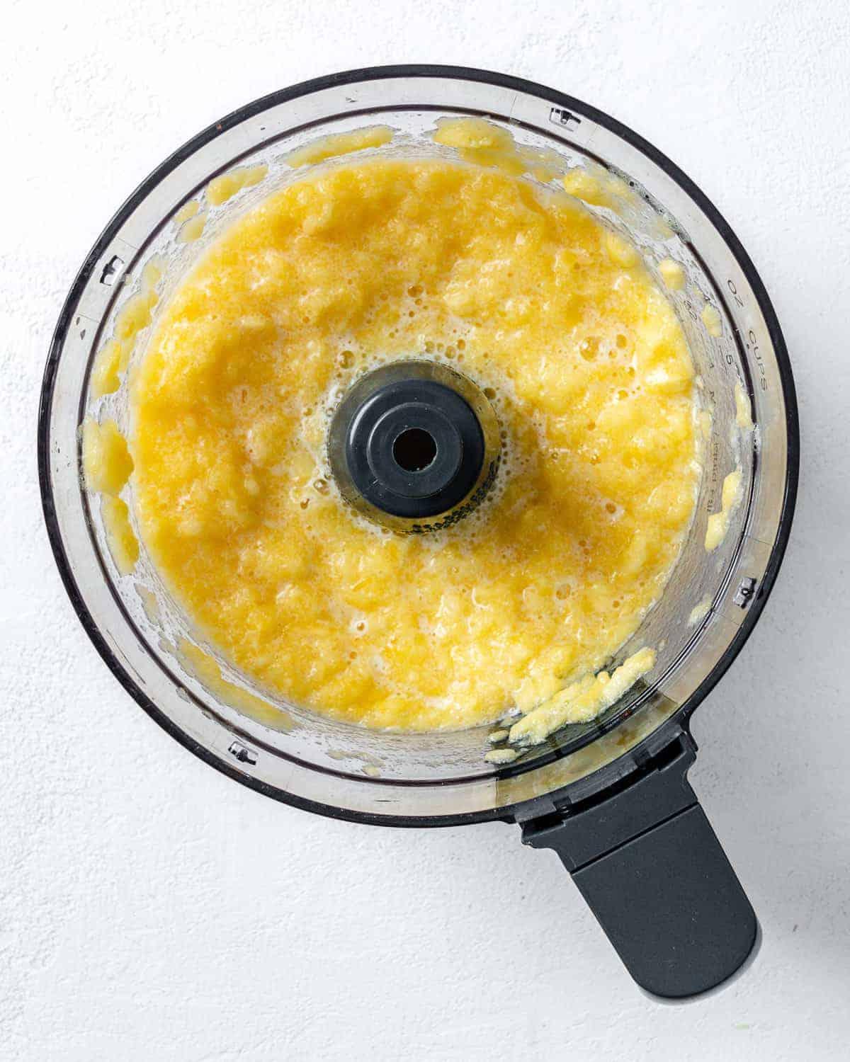 Veganer Kokos-Ananas-Kuchen 5 Arbeitsschritt: Ananas nach dem Mixen im Mixer