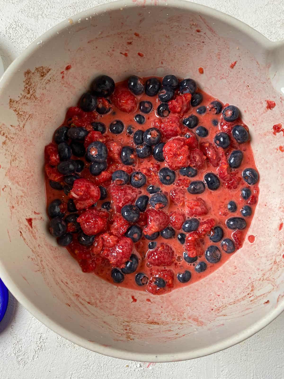 process shot of berries being added to a bowl