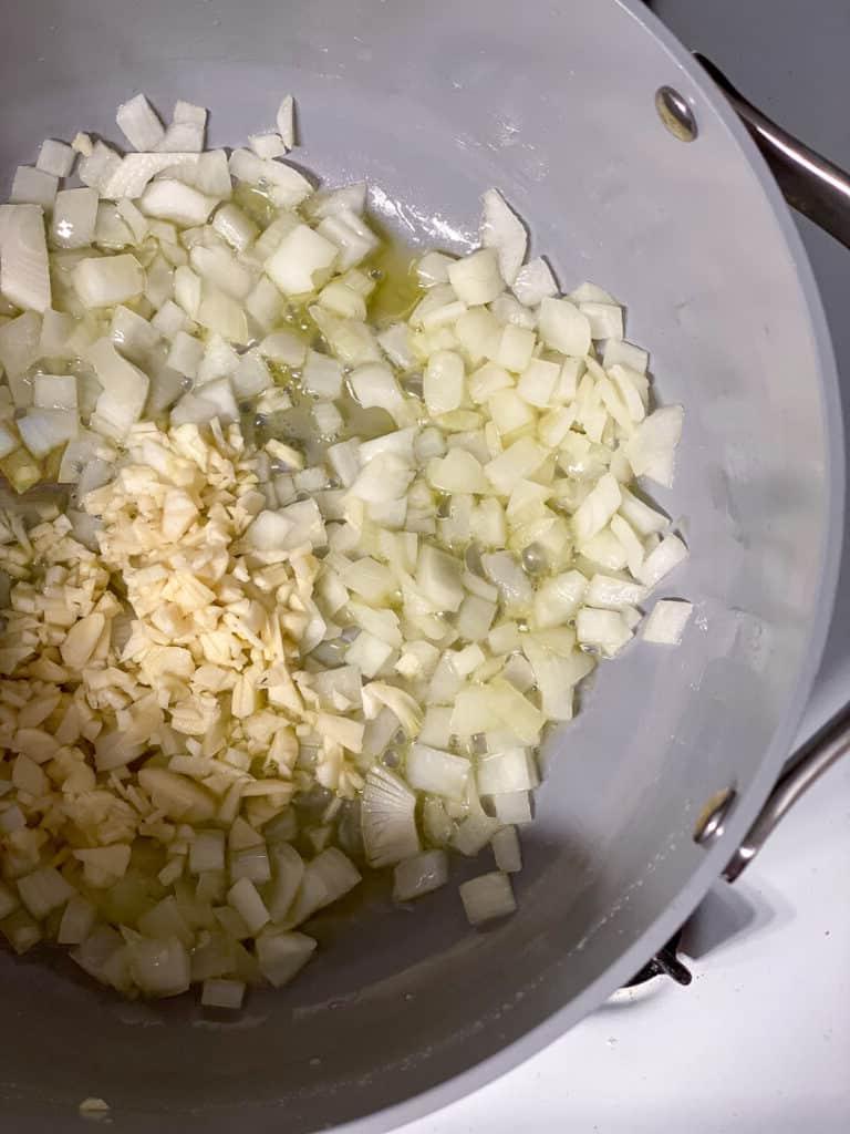 garlic and onion cooking in pan
