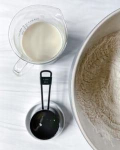 process of vanilla scones being made with wet and dry ingredients in separate bowls