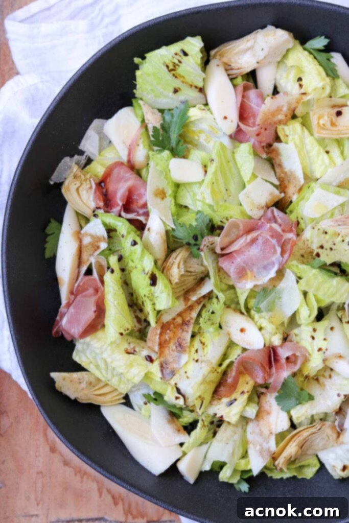 hearts salad with prosciutto in bowl