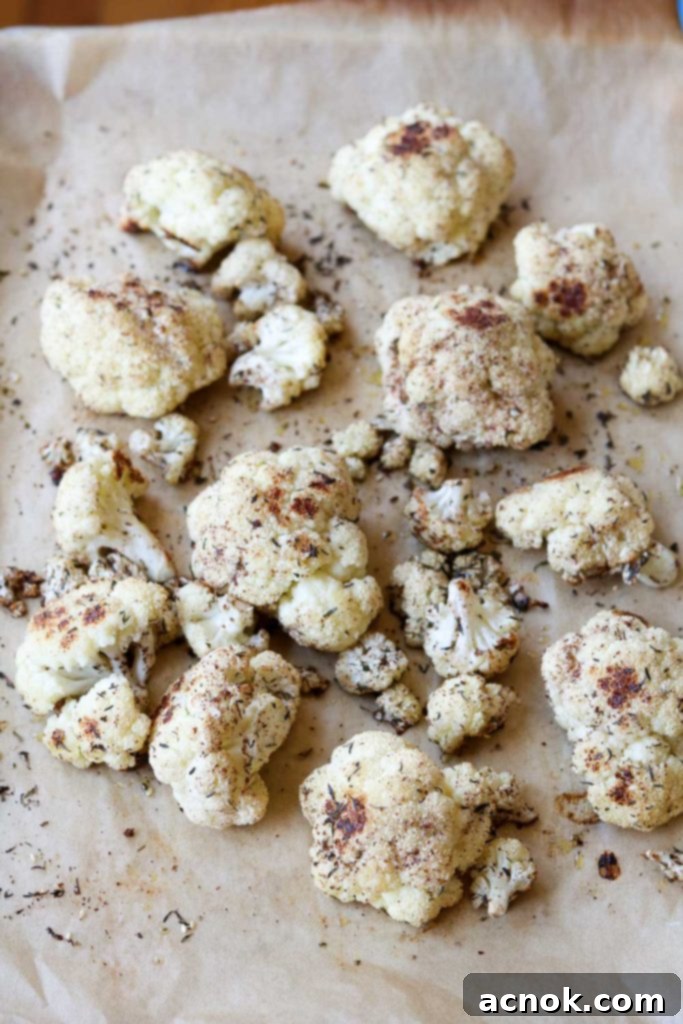 Za'atar seasoned cauliflower spread on a baking sheet