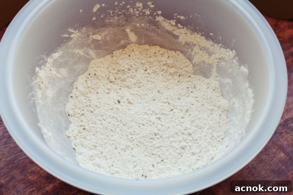 dry cracker ingredients mixed in a bowl