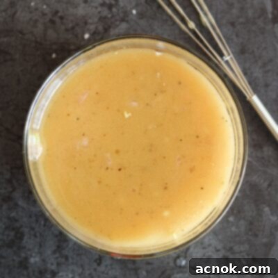 White Balsamic Honey Mustard Vinaigrette ready to be served