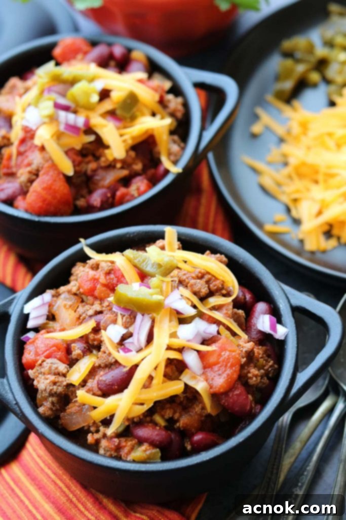 Hearty Beef Chili in a rustic cast iron cocotte, ready to be served