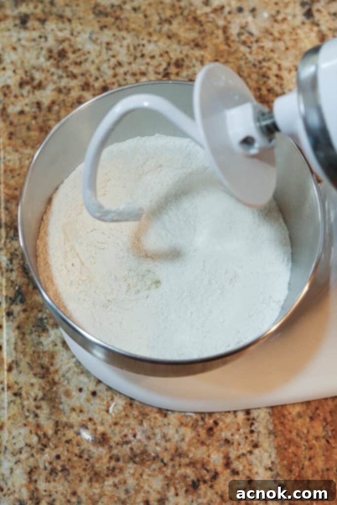 dry ingredients in stand mixer for pizza dough