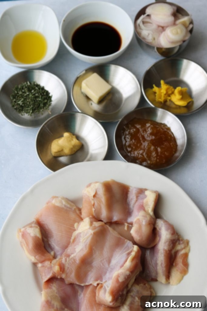 Ingredients for Chicken in Shallot Fig Butter Sauce recipe laid out on a kitchen counter.