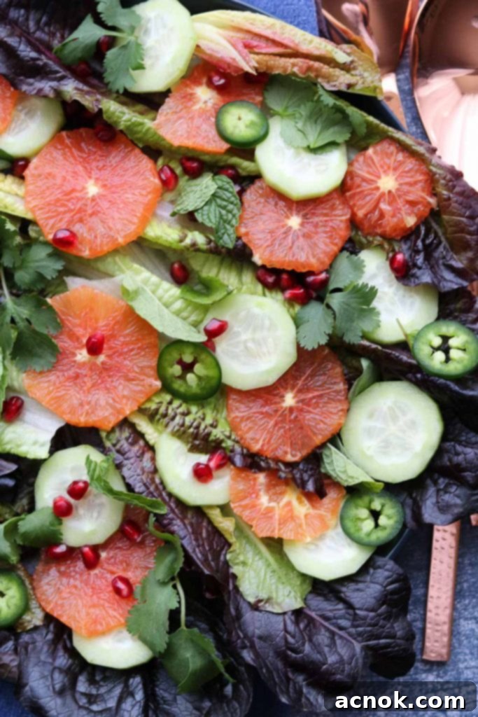 Winter citrus salad ready to be served with elegant serving utensils