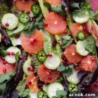Winter Citrus Salad on plate with burgundy napkin