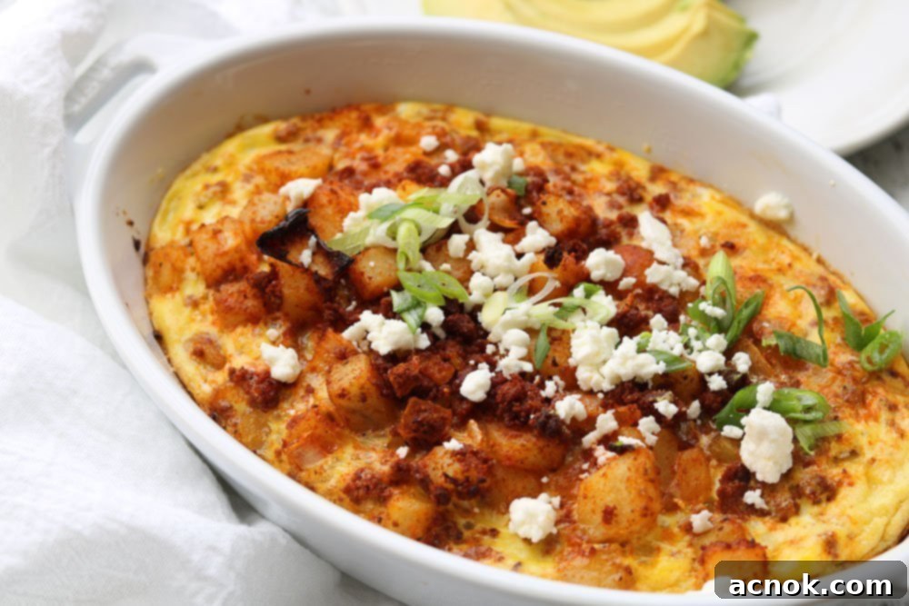 Baked Mexican Chorizo and Eggs with avocado in the background