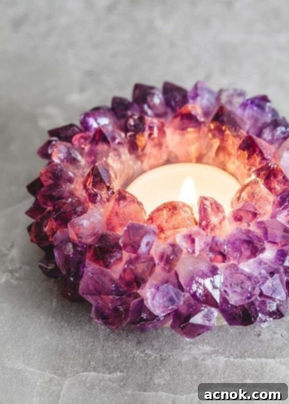 Amethyst candle holder with a lit candle, symbolizing hope, introspection, and healing during challenging times