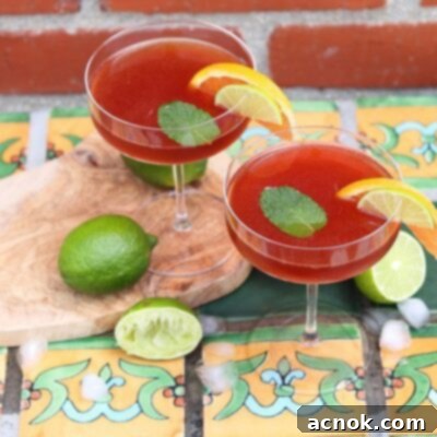 Pomerita cocktail top view and citrus on cutting board