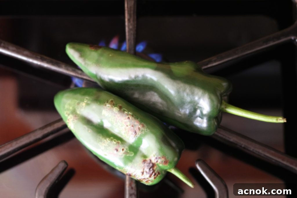 poblanos roasting on stovetop