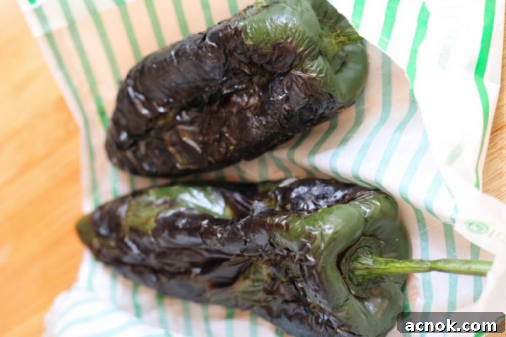roasted poblanos ready to peel