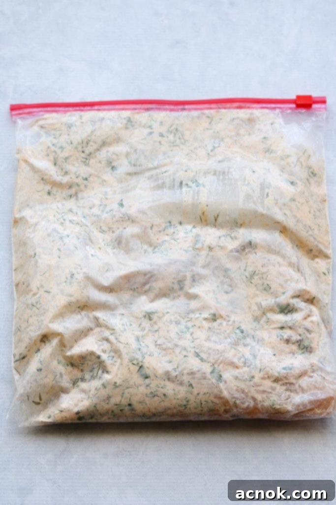 chicken marinating in ziplock bag