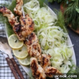 Yogurt Herb Marinated Grilled Chicken on skewers, ready to serve.