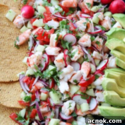 Shrimp ceviche in large platter with avocado and tostadas