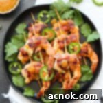 chutney glazed bacon wrapped shrimp plated and garnished