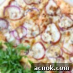 puff pastry with pears on wood board with arugula