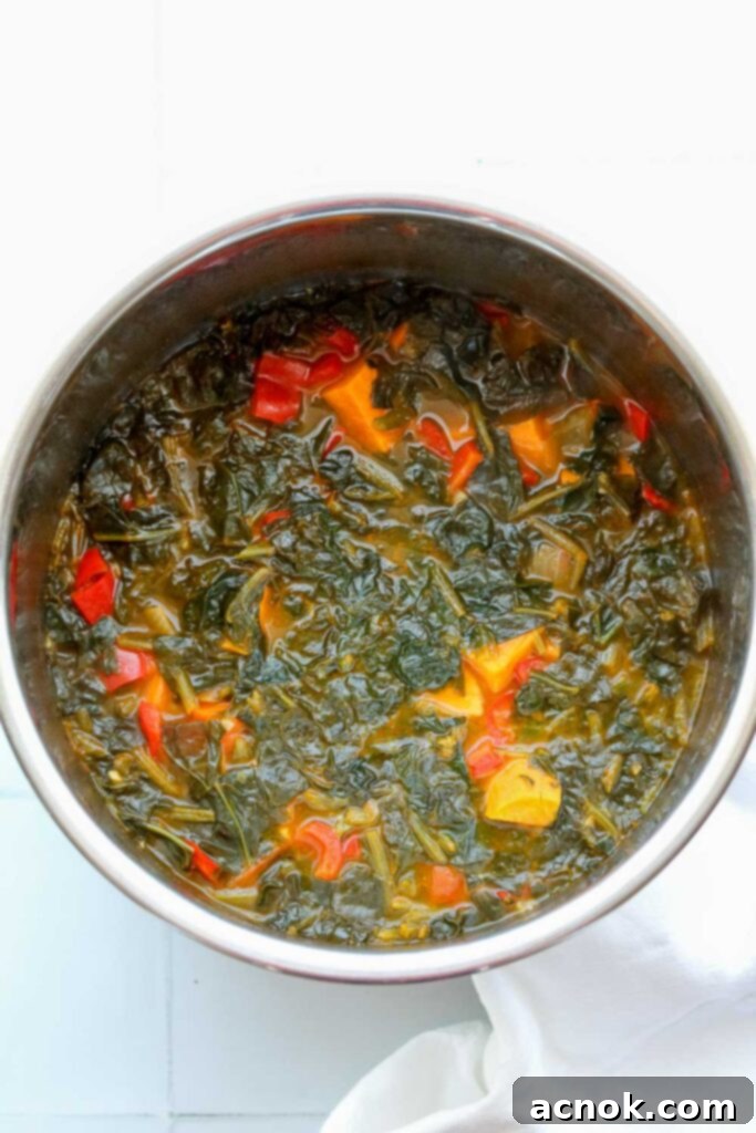 spiced sweet potato and spinach soup after cooking