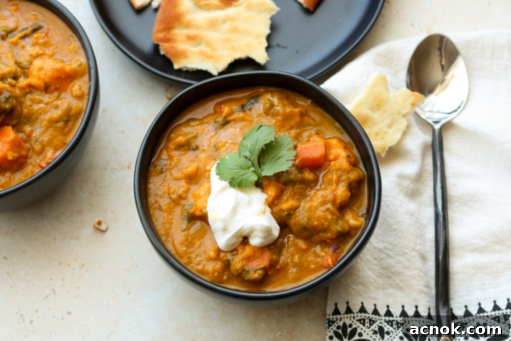 Delicious bowl of Spiced Sweet Potato and Spinach Soup, perfect for a cozy meal.