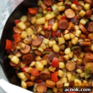 spiced potato hash, sausage on skillet