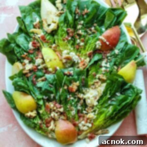 square image of little gem pear and gorgonzola salad with serving utensils