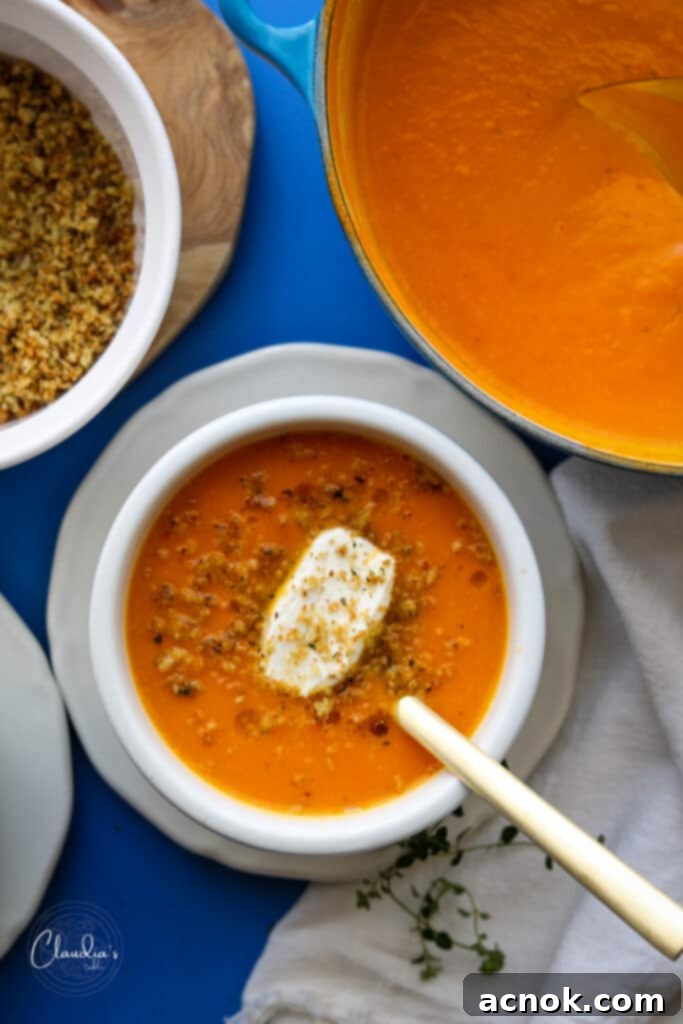 cup of soup with pot and bowl of breadcrumbs