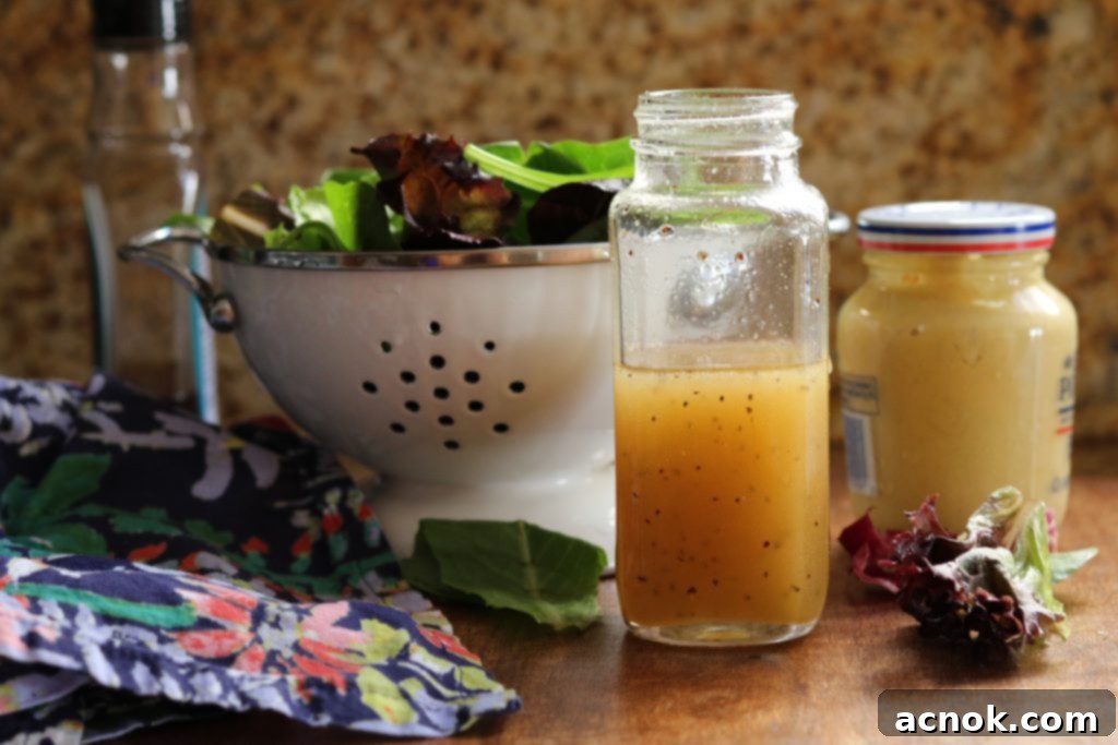 Delicious Maple Vinaigrette Dressing in a jar, ready for salads and autumn dishes