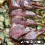 horizontal image of rack of lamb with couscous
