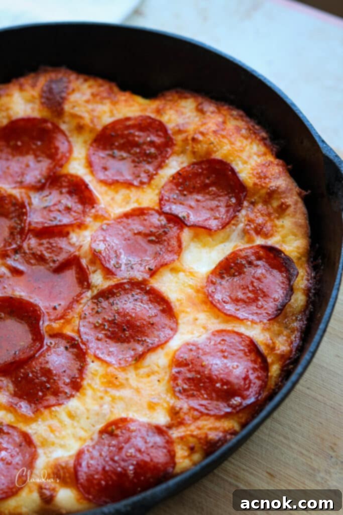 pan pizza in cast iron pan 