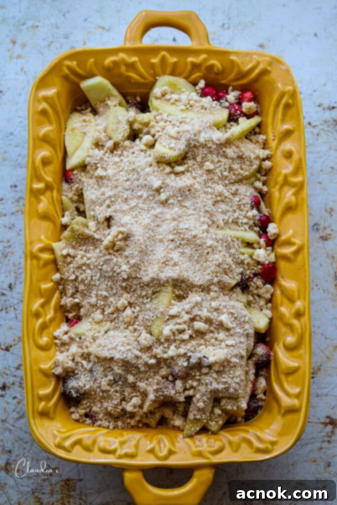 Apple cranberry mixture covered with crumble topping