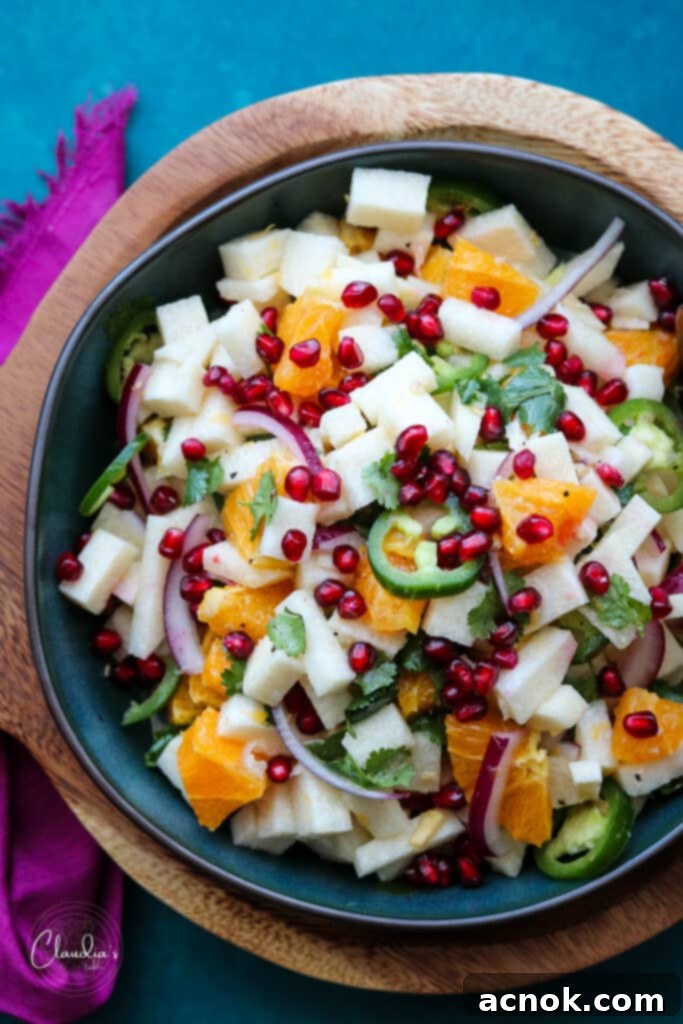 jicama orange salad with pomegranate, jalapeños in orange honey dressing