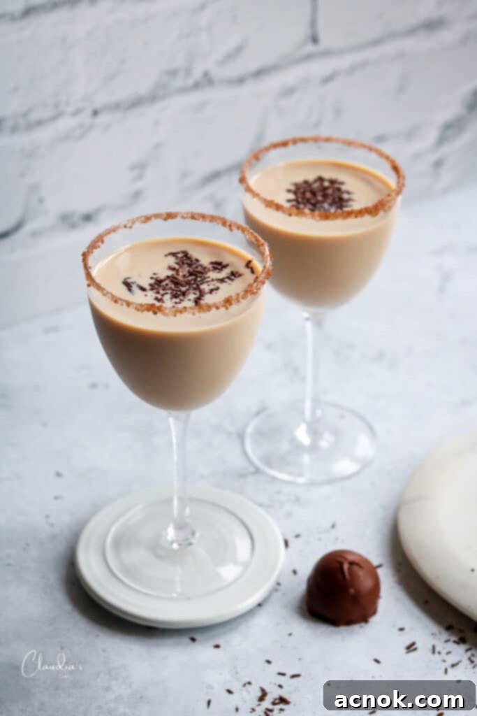 Irish cream and vodka martinis in coupe glasses with chocolate garnish 