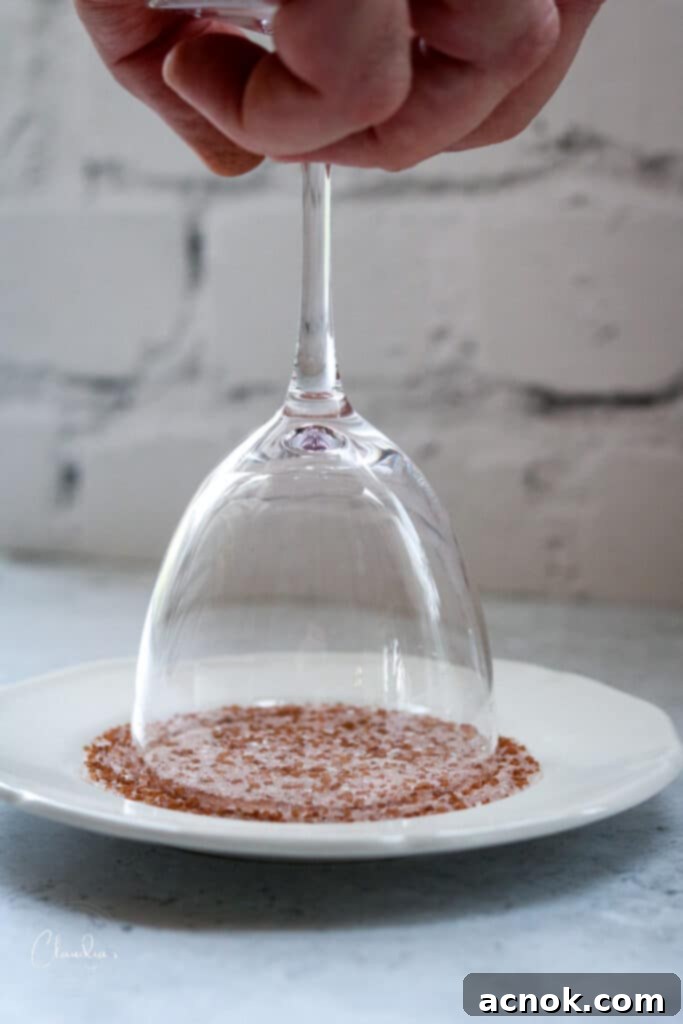 dip glass rim into sugar or salt 