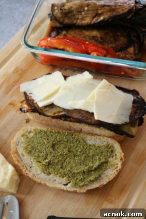 Grilled vegetable sandwich with Asiago and Pesto, stacked and ready for the grill