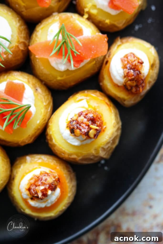 Mini stuffed potatoes topped with chili crisp for a spicy kick.