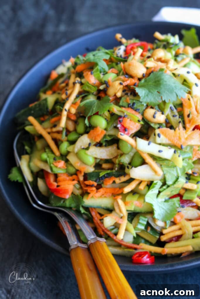crunchy Bok Choy salad with spicy peanut dressing with fresh cilantro and sesame seeds