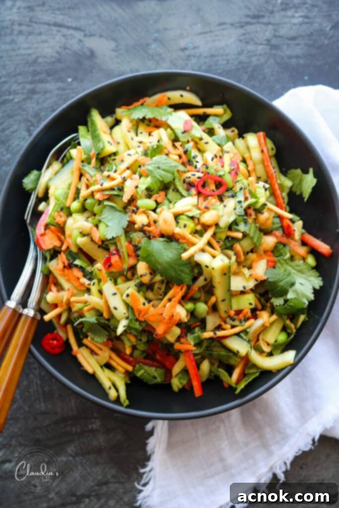 Bok Choy salad in black bowl, ready to be served