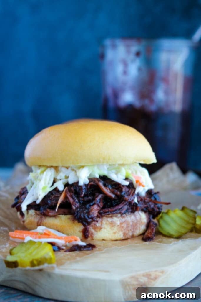 pulled pork sandwich using cherry barbecue sauce 