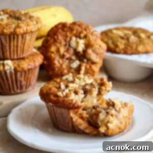 Golden banana and oat muffins on a white plate, ready to be served.