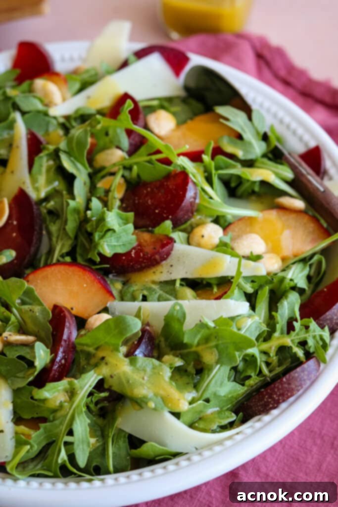 Side view of the prepared Plum Salad, highlighting its layers and freshness.