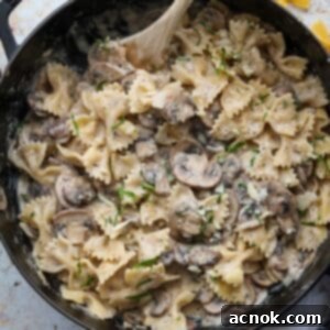 close up mushroom pasta in pan