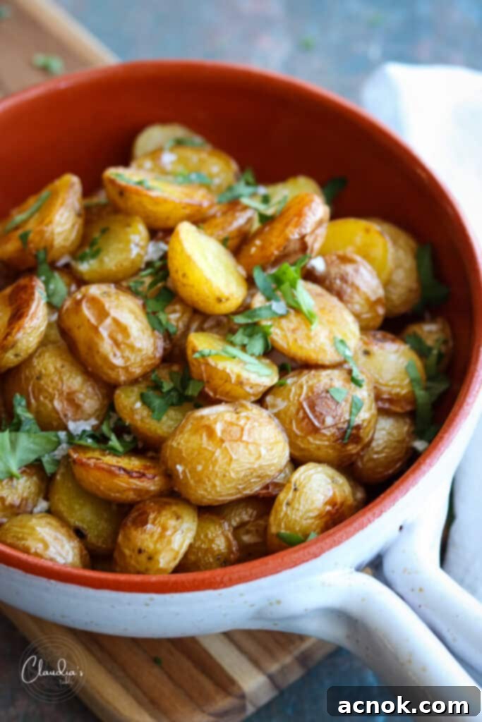 Simple crispy oven roasted potatoes with 3 ingredients, served hot.
