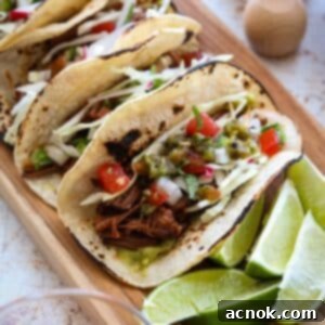 square image of braised brisket tacos