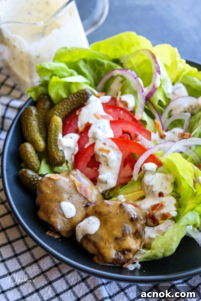 Simple cheeseburger salad with spicy dill pickle ranch dressing.