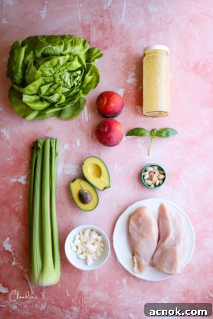 Ingredients for grilled peach avocado chicken salad laid out